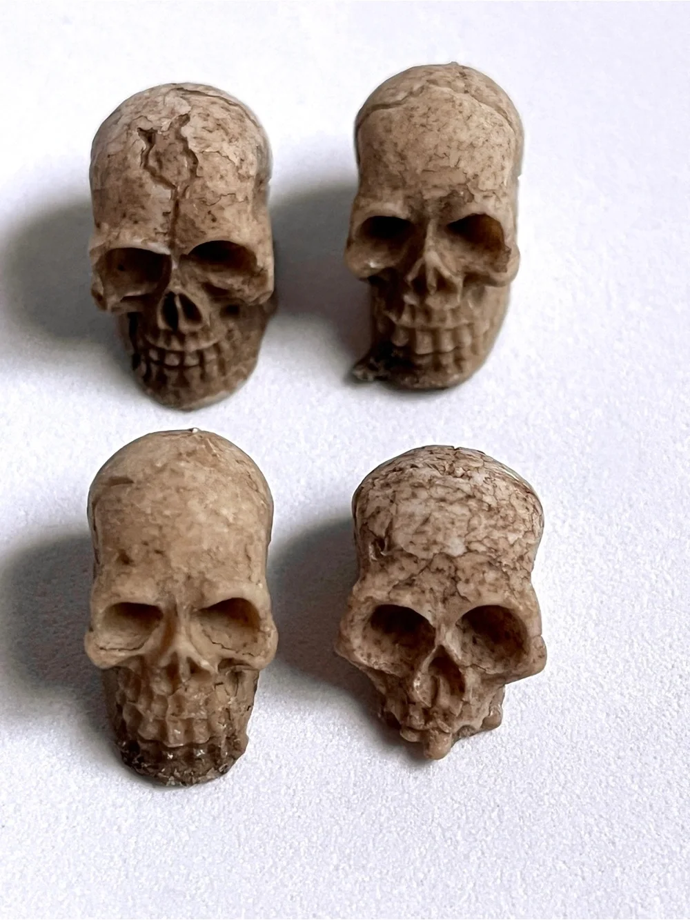 Set of 4 Decorative Clay Skull Accents in Beige- Mini, New, Fun!